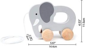 img 1 attached to 🐘 Hape Elephant Push and Pull Wooden Toddler Toy - Dimensions: Length: 5.7 inches, Width: 2.4 inches, Height: 4.5 inches