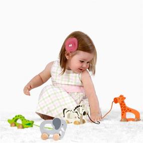 img 2 attached to 🐘 Hape Elephant Push and Pull Wooden Toddler Toy - Dimensions: Length: 5.7 inches, Width: 2.4 inches, Height: 4.5 inches