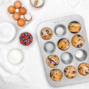 img 2 attached to USA Pan Aluminized Steel Bakeware Set: 6-Piece Collection with Cookie Sheet, Half Sheet, Loaf Pan, Rectangular Pan, Square Cake Pan, and 12 Cup Muffin Pan