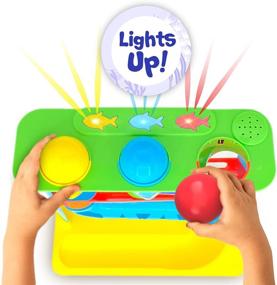 img 1 attached to 🐠 Детская интерактивная игрушка Move2Play для мальчиков и девочек от 9 месяцев и старше - Корми рыбку