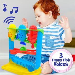 img 2 attached to 🐠 Детская интерактивная игрушка Move2Play для мальчиков и девочек от 9 месяцев и старше - Корми рыбку