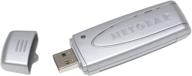 improved wireless g usb adapter by netgear - model wg111us logo