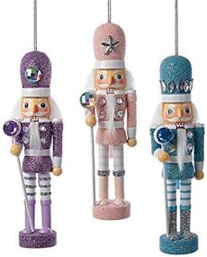img 1 attached to 🎄 Kurt Adler 6-Inch Hollywood Pastel Nutcracker Christmas Ornaments - Set of 3 Assorted