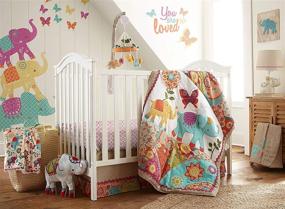 img 4 attached to Levtex Baby Zahara Crib Bed Set - Boho Elephant - 5 Piece Nursery Set with Quilt, Fitted Sheet, Diaper Stacker, Wall Decal & Skirt/Dust Ruffle - Vibrant Orange, Teal, Yellow, Red, Fuchsia Color Palette