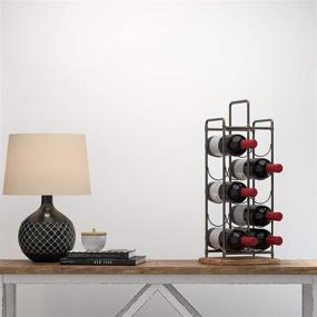 img 1 attached to Stylish Stone & Beam Contemporary Farmhouse Standing Floor Wine Rack - 27 Inch, Iron and Wood on Amazon