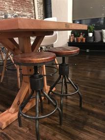 img 2 attached to 🪑 Pair of Vintage Industrial Bar Stools - Adjustable Round Wood Metal Swivel Stools - Cast Iron Base - Farmhouse Kitchen Counter Height Stools (23-30 Inches)