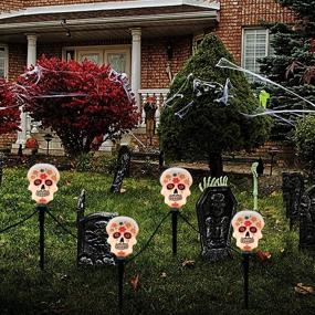 img 1 attached to 🎃 Goothy Halloween Skulls Pathway Markers Lights, Set of 4 Grimace Lights with Stake, 7Ft Connectable Halloween Pathway String Lights for Garden Patio Walkway Home Party Decoration, Black Wire