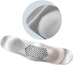 img 2 attached to DCOU Stainless Steel Garlic Press Rocker with FREE Silicone Tube Roller - Effortlessly Crush Garlic and Improve Your Cooking!