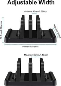 img 1 attached to Adjustable Dual Slot Docking Station for Space Saving Books - Sleek Black Design