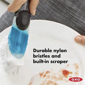 img 1 attached to 🧽 OXO Good Grips Soap Dispensing Dish Brush: Efficient Kitchen Cleaning Tool 15x10x5cm