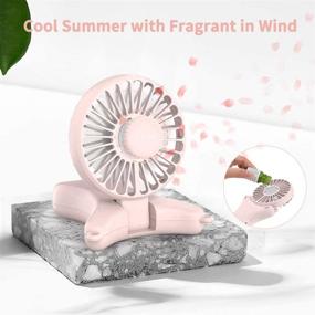 img 1 attached to FUNME Hands-Free USB Personal Fan - 3350mAh Battery-Powered Necklace Fan | Up to 17 Hours of Use | Rechargeable Handheld Fan | 3 Speeds | Foldable | Built-in Soft Light | Outdoors Travelling & Indoor | Pink