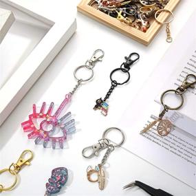 img 1 attached to 🔗 Versatile Moxweyeni 250-Piece Swivel Snap Hooks with Keychain Rings Set - 35 Clasps, 35 Rings, and 180 Screw Eye Pins in Assorted Vibrant Colors