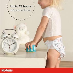 img 2 attached to Подгузники для младенцев Huggies Snug & Dry, размер 1, 38 шт: Надежный комфорт и защита