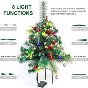 img 2 attached to Set of Two 24.5in Outdoor Battery Operated Pre-Lit Pathway Christmas Trees: Pathway Christmas Trees Holiday Décor for Driveway, Yard, Garden with LED Lights, Red Berries, Frosted Pine Cone, and Ornament