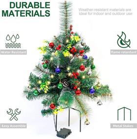 img 1 attached to Set of Two 24.5in Outdoor Battery Operated Pre-Lit Pathway Christmas Trees: Pathway Christmas Trees Holiday Décor for Driveway, Yard, Garden with LED Lights, Red Berries, Frosted Pine Cone, and Ornament