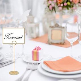 img 2 attached to 🌟 Stylish Urban Deco 16-piece Table Card Holder Set - Elegant 8-inch Gold Place Steel Card Holders for Photos, Food Signs, Memo Notes - Perfect for Weddings, Restaurants & Birthdays!