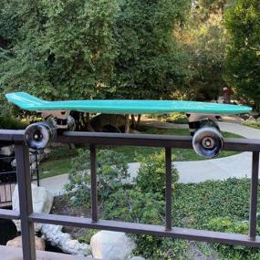 img 3 attached to 🛹 22-inch Teal Green Mini Retro Cruiser Skateboard with Swirl Wheels, High-Quality ABEC 7 Bearings, Durable and Reliable, Ideal for Kids or Adults, Conveniently Fits in Your Bag, No Assembly Needed