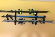 🎿 ski storage rack: convenient horizontal wall organization by storeyourboard logo