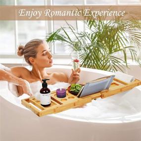 img 3 attached to 🛁 Olebes Expandable Bamboo Bathtub Caddy Tray - Wood Bath Tray Organizer with Book and Wine Glass Holder & Cell Phone Slot for Spa, Bathroom, and Shower