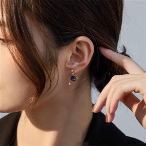 img 1 attached to 🌙 Captivate with Coadipress Astronaut Moon Stud Earrings: Creative Cosmic Charm Jewelry for Women and Girls - Perfect Birthday or Graduation Gift