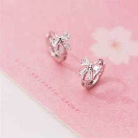 img 2 attached to 🦋 Dainty Butterfly Cartilage Hoop Earrings: Sterling Silver CZ Crystal Knot Huggie Hoops for Women and Teen Girls (8mm)