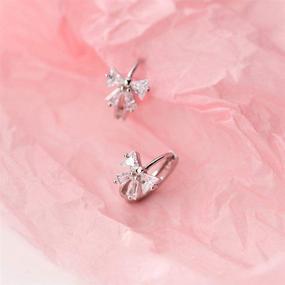 img 1 attached to 🦋 Dainty Butterfly Cartilage Hoop Earrings: Sterling Silver CZ Crystal Knot Huggie Hoops for Women and Teen Girls (8mm)