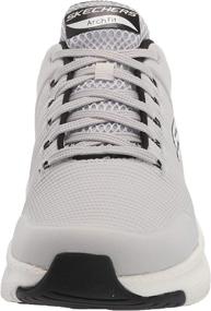 img 3 attached to 👟 Skechers Arch Titan Men's Shoes in Black and White