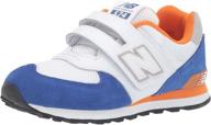 new balance kids' 574 v1 leather sneaker: stylish comfort and durability for young feet logo