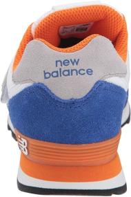 img 2 attached to New Balance Kids' 574 V1 Leather Sneaker: Stylish Comfort and Durability for Young Feet