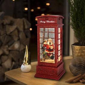img 1 attached to 🏻 Enhanced Christmas Snow Globe Lantern - Phone Booth Style, Battery Operated with Swirling Water Glittering Effect, Ideal Festival Ornament with Timer for Tabletop Centerpiece and Home Decoration