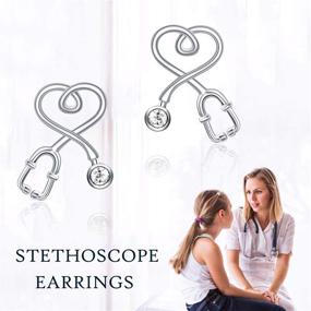 img 2 attached to ⚕️ Nurse Heart Stud Earrings - Sterling Silver Stethoscope Design with Simulated Birthstone Crystals, Ideal Fine Jewelry Gifts for Nurses, Doctors, RNs, and Medical Students