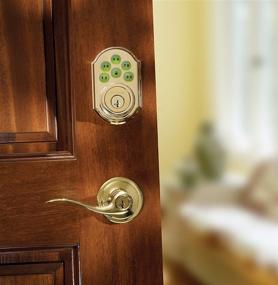 img 1 attached to 🔒 Enhanced Security with Kwikset 909 SmartCode Electronic Deadbolt featuring SmartKey in Lifetime Polished Brass