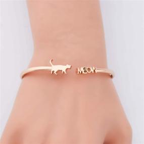 img 1 attached to Cat Lover's Jewelry: Adorable Tiny Cat Meow Cuff Bracelet, Perfect for Gifts