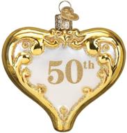 old world christmas anniversary heart logo