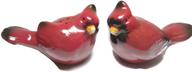 pinecone cardinal salt pepper shaker logo