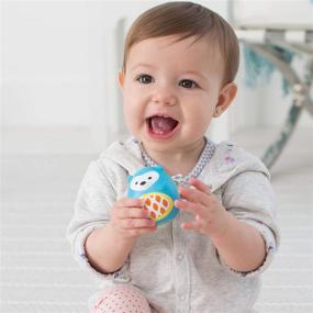 img 1 attached to 🥚 Исследуйте веселье: набор игрушек для малышей Skip Hop Egg Shaker Trio - Explore & More, 3 предмета