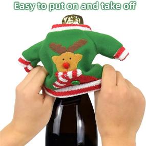 img 1 attached to IWNTWY Christmas Wine Bottle Cover Set: Handmade Sweater Santa Claus Snowman Reindeer Covers - Perfect Xmas New Year Party Table Decor, Set of 3