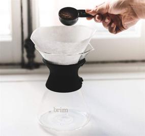 img 2 attached to ☕ Набор для заваривания кофе Brim Pour Over - Готовьте богатый, полнотелый кофе каждый раз! Включает стеклянную кувшинку, мерную ложку, силиконовый чехол и экологический многоразовый фильтр - черный.