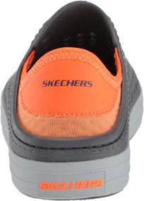 img 2 attached to 👟 Skechers Foamies Guzman Steps-Aqua Surge Sneaker for Boys, Charcoal/Orange, Size 12 Little Kid