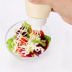 img 1 attached to MXY Japanese Creative 5 Hole Design Squeeze Bottle for Salad, Vinegar, Ketchup, Honey, and Oil - 380ml (White) with Dust Lid