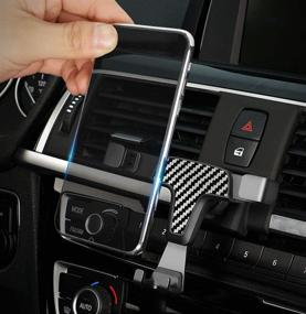 img 1 attached to 📱 iJDMTOY Smartphone Gravity Holder with Dash Mount Clip-On for BMW F30/F31 3 Series, F32/F33 4 Series (Doesn't Block Air Vent)