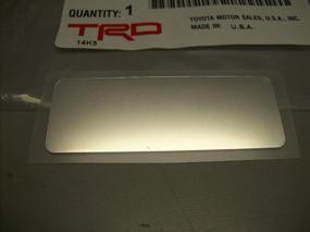 img 2 attached to 🚗 Genuine Toyota Parts: Enhance Your Ride with TRD Emblem (PTR26-17640)
