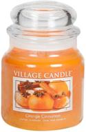 village candle orange cinnamon scented логотип