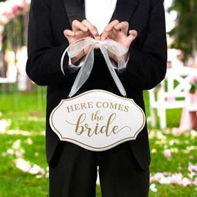 img 1 attached to 💍 Lillian Rose Comes The Bride Flower Girl Ring Bearer Sign: Elegant and in White (11"x7")