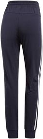 img 2 attached to 👖 adidas Women's Essentials 3-Stripes Tricot Open Hem Pants - Perfect Blend of Style and Comfort!