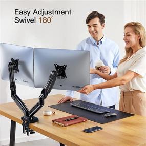 img 2 attached to 🖥️ HUANUO Dual Monitor Stand - Adjustable Spring Desk Mount for 17-27 Inch Computer Screens - Holds 4.4-14.3lbs Each Arm.