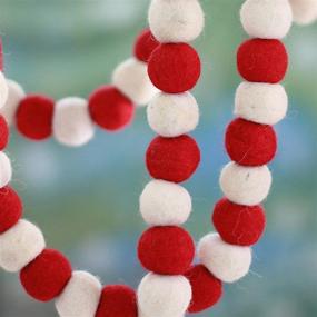 img 1 attached to 🎄 NOVICA Red and White Felted Wool Christmas Tree Garland with Candy Cane Pompoms - Handmade Holiday Decoration