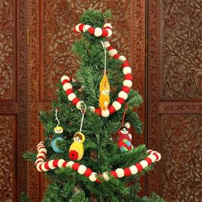 img 2 attached to 🎄 NOVICA Red and White Felted Wool Christmas Tree Garland with Candy Cane Pompoms - Handmade Holiday Decoration