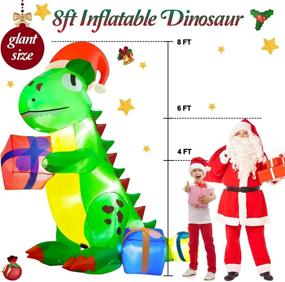 img 3 attached to Light-Up Dinosaur Christmas Inflatables - 8FT Outdoor Decorations with Gift 🎄 Box - Giant Xmas Holiday Yard Décor for Garden and Lawn - RACPNEL