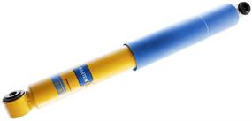 img 1 attached to 🟨 Bilstein 24-187121 Rear Shock for Nissan Xterra 4WD - Enhanced Performance in Vibrant Yellow